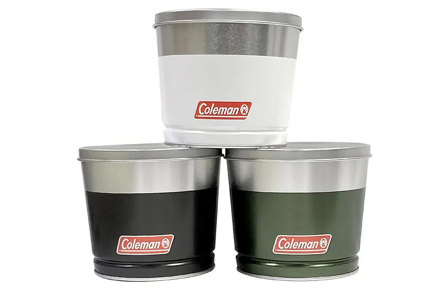 Coleman tin candles with lid come in green black and white